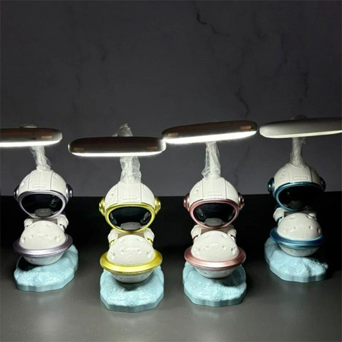 چراغ مطلالعه رومیزی طرح فضانورد تصویر رنگ ها روشن